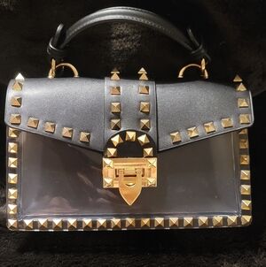 Black and clear plastic purse